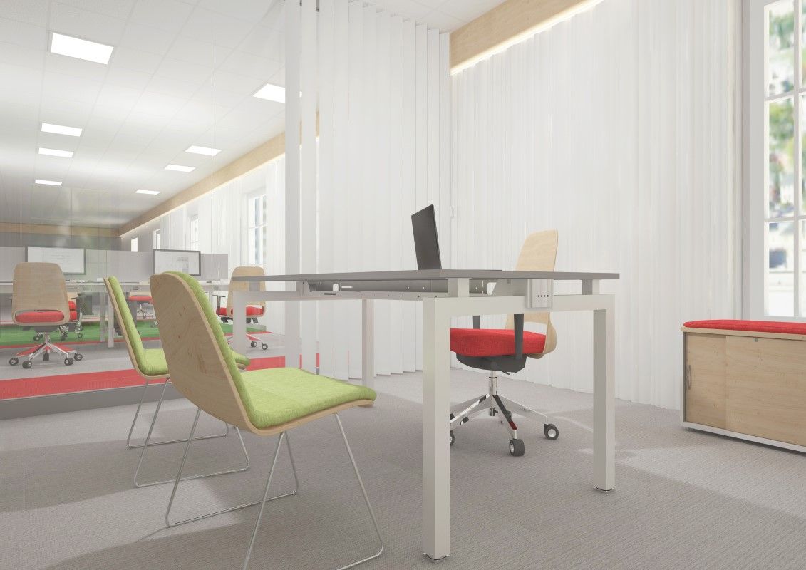 W przestrzeni biurowej znajduje się stelaż do biurka z nowoczesnym designem.